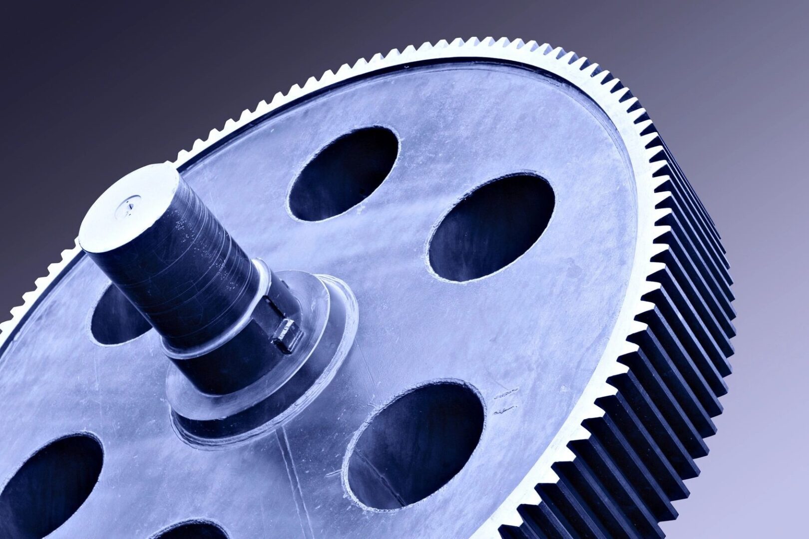 A close up of the gears on a machine